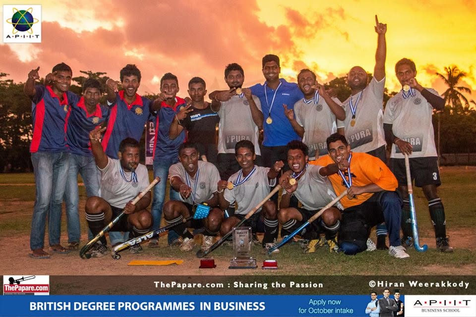 Piumal celebrating with his university hockey championship team