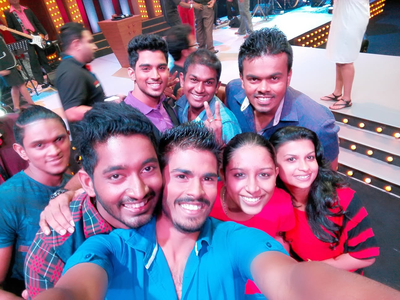 Piumal with fellow performers on a Sri Lankan television set